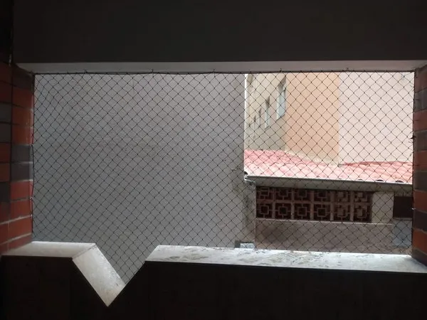 Instalação de rede de proteção em varanda