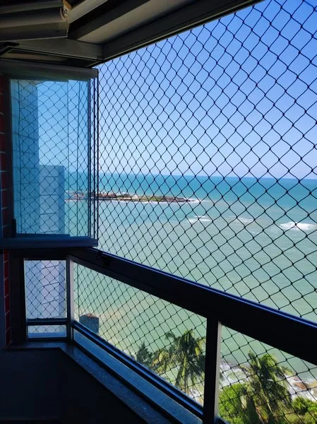 Tela de proteção para varanda